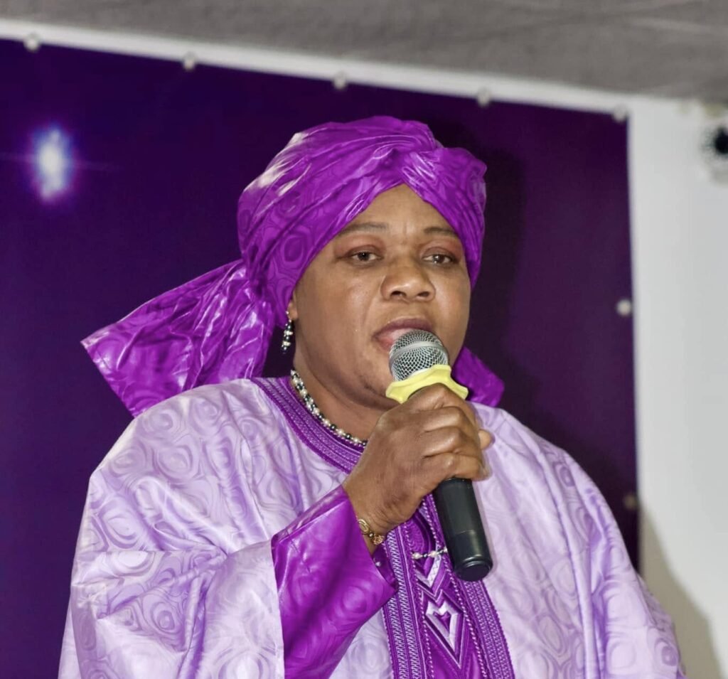Young woman with long straight hair looking thoughtful during a church service.