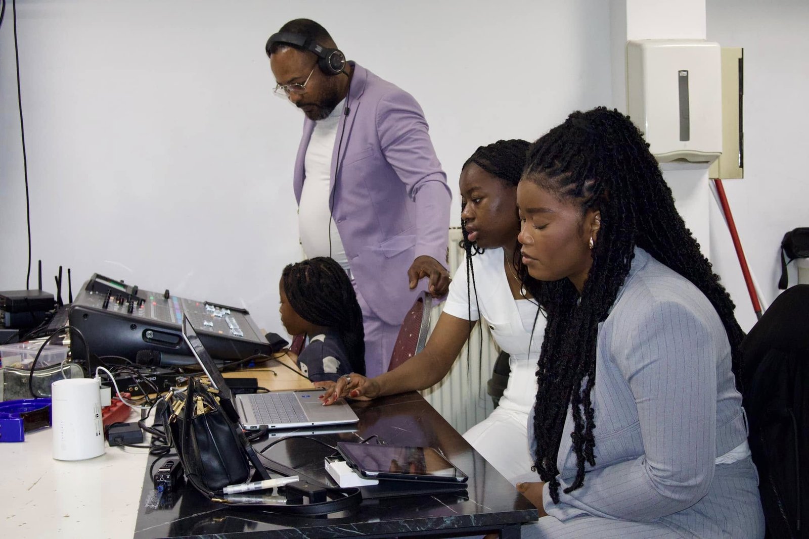Team working on audio-visual tasks during a live event
